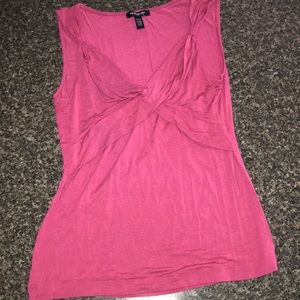 pink tank top with knot in front. stretchy